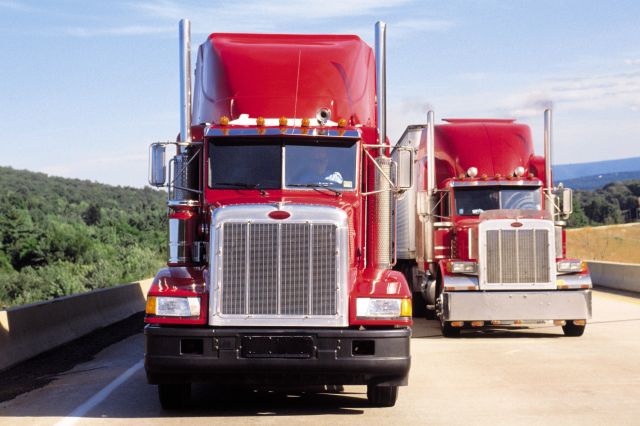 Two red trucks